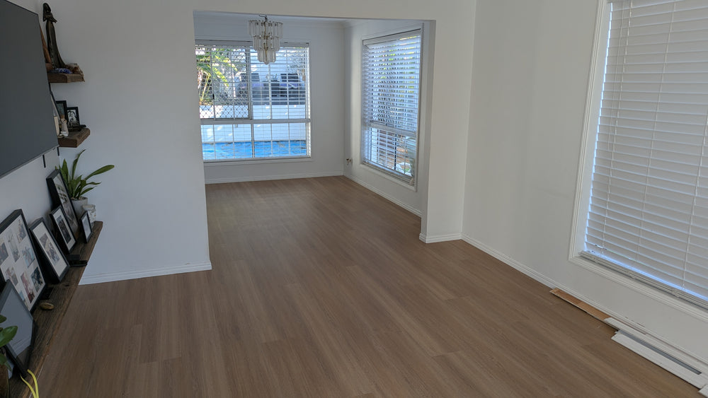 Completed replacement hybrid flooring in the living area